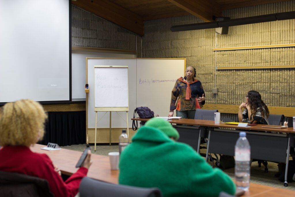 Sandy Rattley talking with the 360 Incubator+ Fellows in the Maple Room.