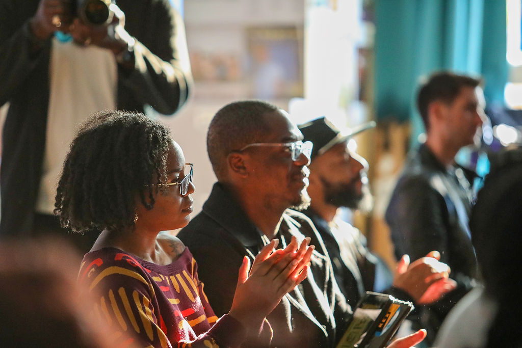 people applauding the presenters at the Torrents BPMplus Showcase