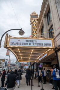 photo of Apollo theater markee on busy NY street