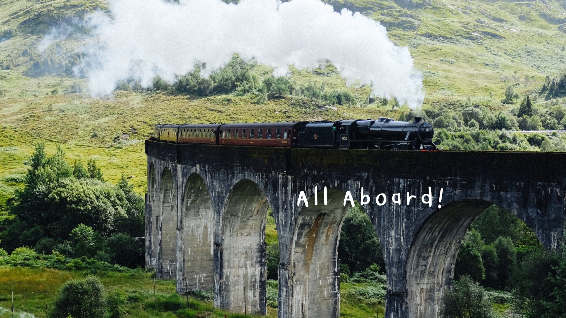 train billowing white smoke traverses an old concrete bridge amid a rural landscape